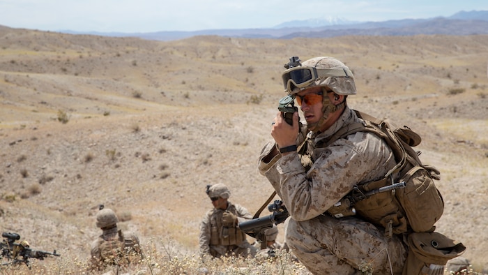 U.S. Marine Corps Lance Cpl. Samuel M. Metz, a machine gunner with 5th Battalion, 1st Marine Regiment, 1st Marine Division, plots his minimal safety line during an integrated training exercise at Marine Corps Air Ground Combat Center, Twentynine Palms, California, April 28, 2019.