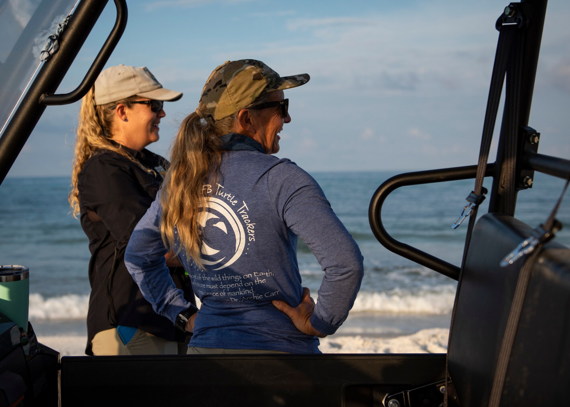 Danielle Bumgardner, U.S. Fish and Wildlife Services biologist, and Rebecca Johnson, Tyndall Natural Resources wildlife and biological technician, look for sea turtle trails on the beach at Tyndall Air Force Base, Florida, June 5, 2019.