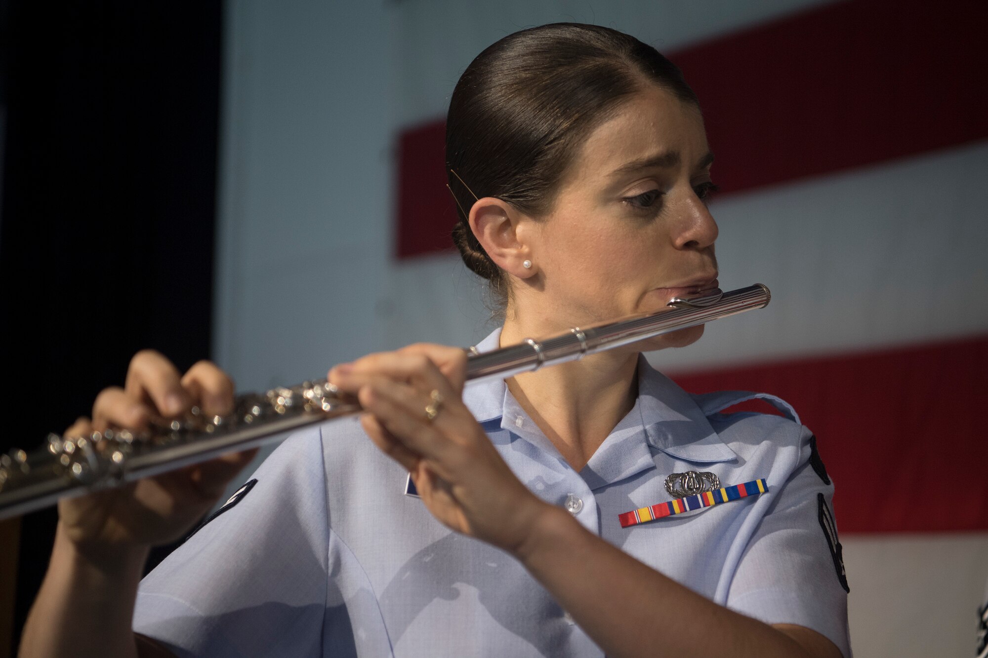 Airman 1st Class Andrea Murano, a flute player with the U.S. Air Force Heritage Winds, performs for veterans and community members June 6, 2019, in Mount Pleasant, S.C.