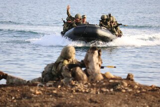 A Zodiac Craft races towards the shore carrying a Mexican Naval Assault Team toward the sector 3 objective in the final exercise for Phase 1 of exercise TRADEWINDS 2019.