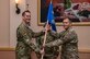 U.S Air Force Lt. Col. Andrew P. Berven, 66th Training Squadron commander, passes the guidon to Maj. Toby A. Andrews, assuming command, during the 66th TRS, Detachment 3, change of command ceremony June 7, 2019, at Joint Base San Antonio-Lackland, Texas. The 66th TRS, Detachment 3, is responsible for providing environmentally specific trained and globally qualified Airmen in Survival, Evasion, Resistance and Escape (SERE) courses.  The detachment selects and trains over 6,000 pipeline technical training Airmen a year in the proper use of principles, techniques, equipment, and procedures necessary to survive anywhere in the world. (U.S. Air Force photo/Johnny Saldivar)
