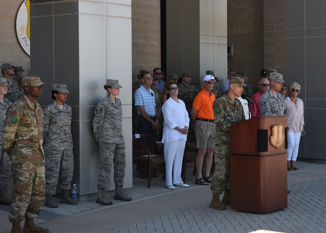 U.S. Air Force Col. Ricky Mills, 17th Training Wing commander, speaks to the crowd during a special D-Day retreat in front of the Norma Brown building on Goodfellow Air Force Base, Texas, June 6, 2019. Mills spoke on remembering the nearly 5,000 American troops who died on D-Day. (U.S. Air Force photo by Airman 1st Class Zachary Chapman/Released)