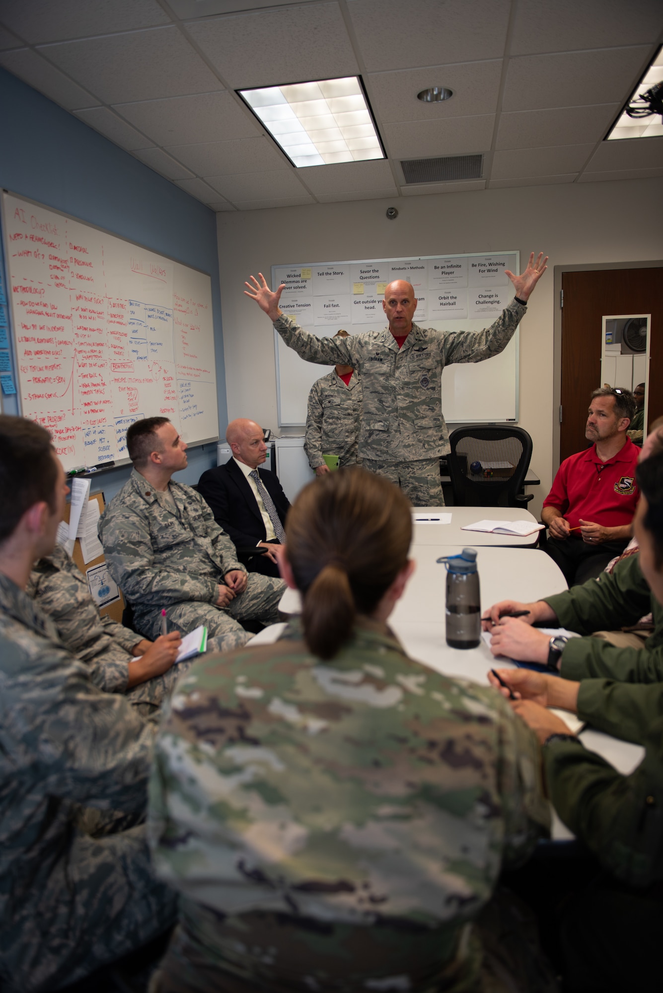 Col. Wayne Straw, Squadron Officer School commadant, gives his feedback to a group of SOS students who are participating in the school's Think Tank elective, May 31, 2019, Maxwell Air Force Base, Alabama. The Think Tank elective challenges Air Force captains to come up with solutions to big Air Force issues.