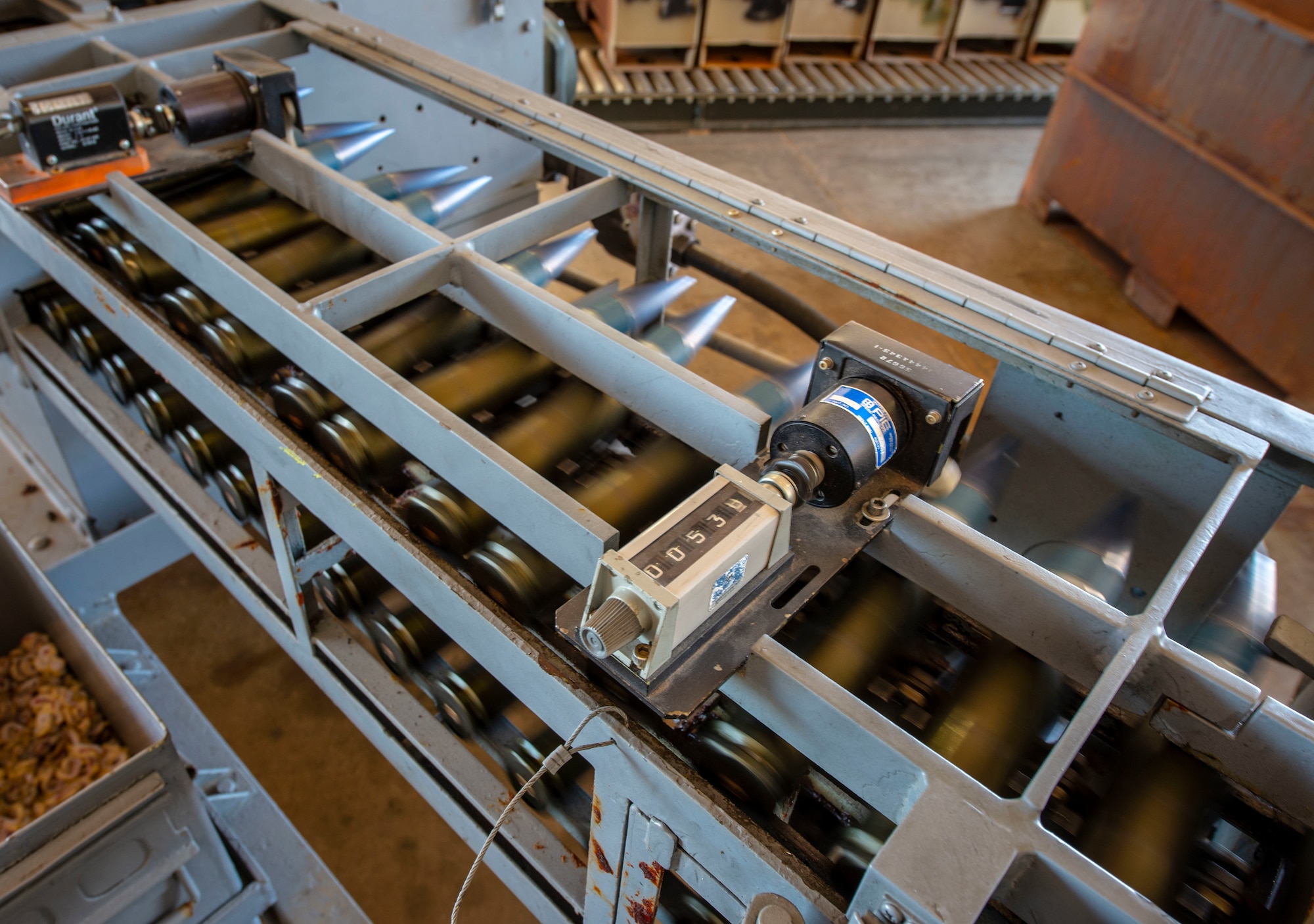 The GFU-7 displays the number of usable rounds as well as separates the 30mm brass from plastic containers at Nellis Air Force Base, Nev., June 4, 2019. The machine is used to separate the 30mm ammunition downloaded from A-10 Thunderbolts and returns the good rounds to another container, making them reusable for reloading onto the aircraft. (U.S. Air Force photo by Staff Sgt. Tabatha McCarthy)
