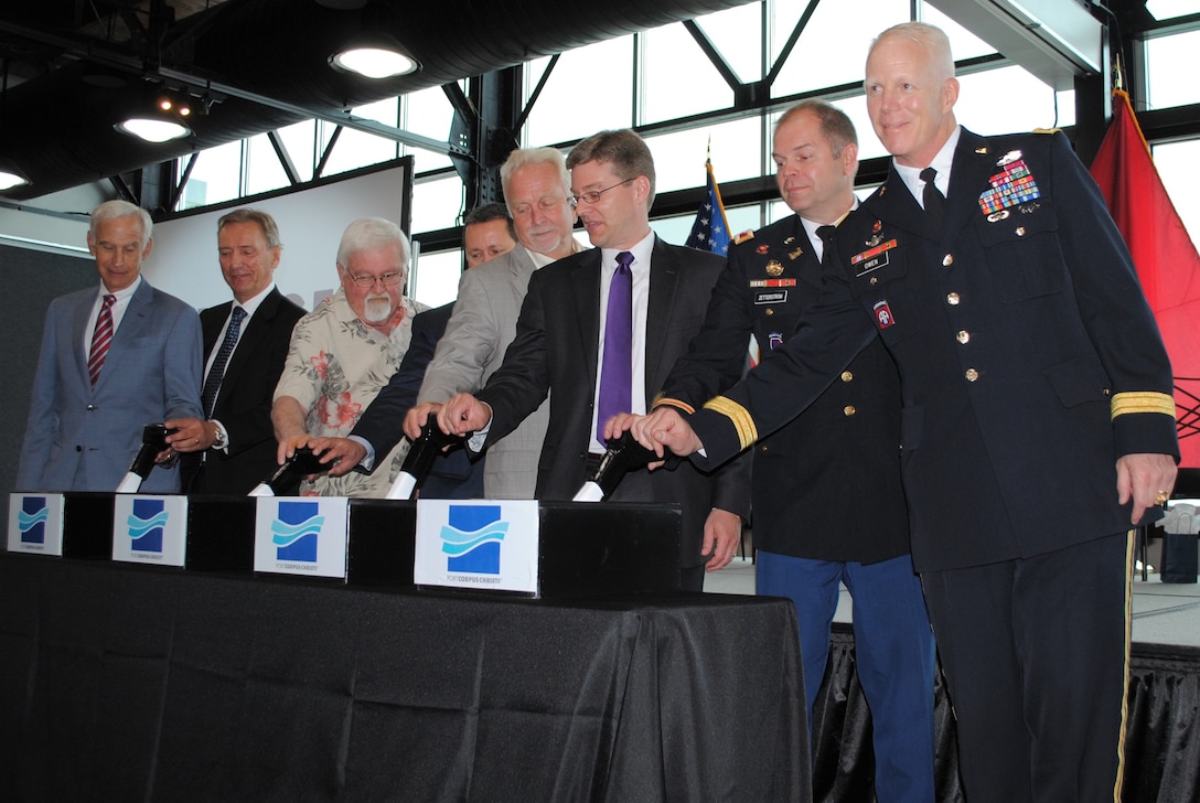 USACE Galveston District along with Port of Corpus Christi celebrate the commencement of the Corpus Christi Ship Channel Improvement Project. Brig. Gen. Paul Owns and Col. Lars Zetterstrom take part in the ceremonial pulling of the lever.