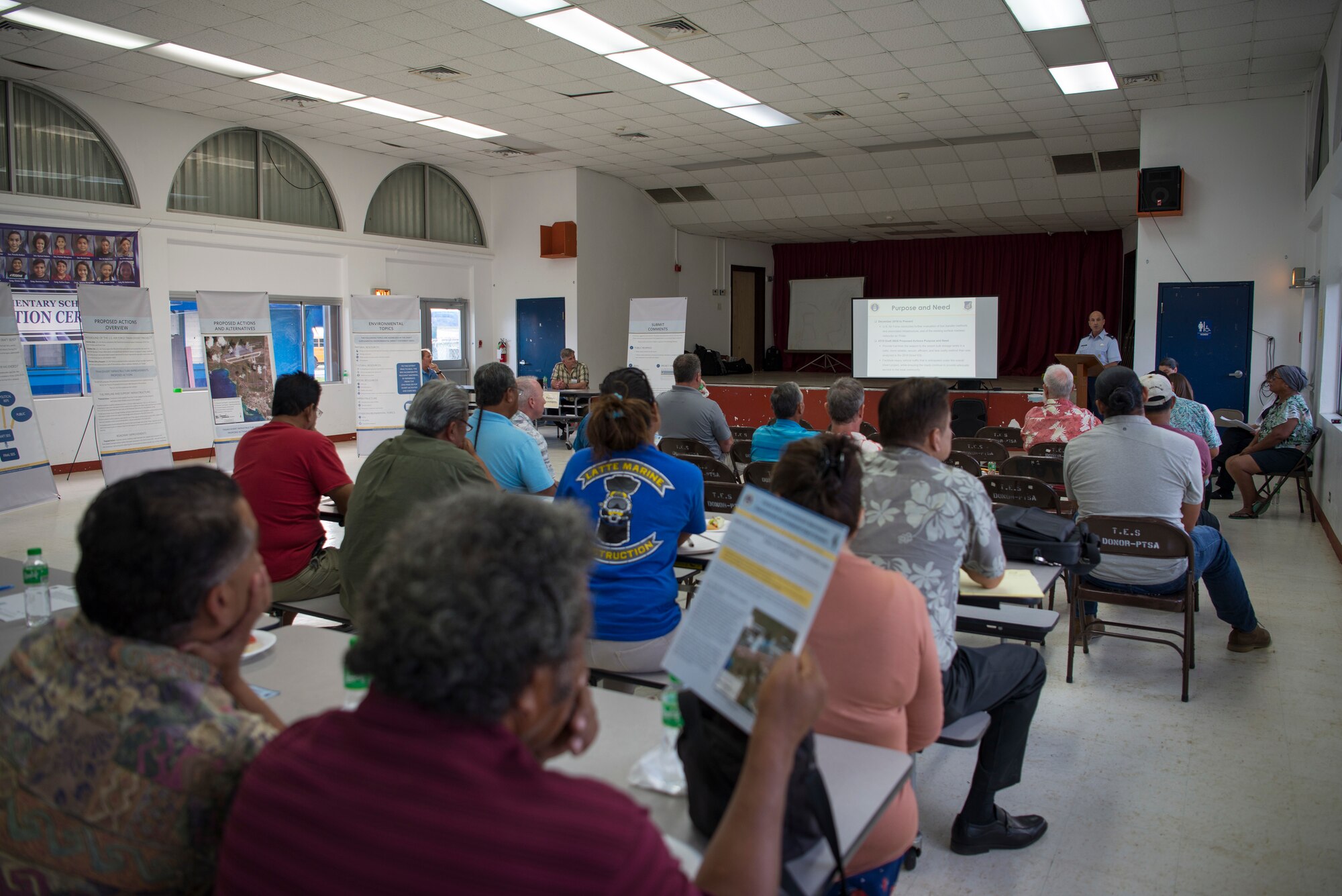 Members of the Tinian government and local community meet with U.S. Air Force representatives at the Tinian Elementary School, Commonwealth of the Northern Mariana Islands, during a public hearing discussing the impact of new fuel pipeline construction and their effect on the local environment and economy June 7, 2019.