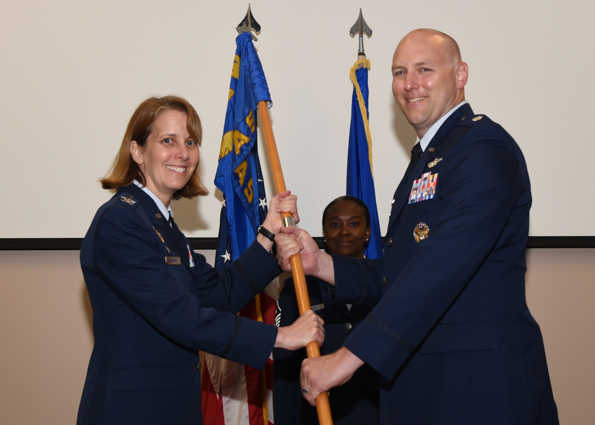 Lt. Col. Matthew Sikkink assumed command of the 815th Airlift Squadron from Col. Jennie R. Johnson, 403rd Wing commander, during change of command ceremony June 6, 2019. (U.S. Air Force photo by Master Sgt. Jessica Kendziorek)
