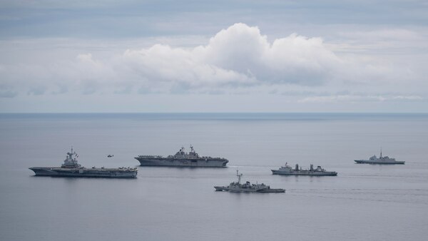 ANDAMAN SEA (June 7, 2019) Amphibious assault ship USS Boxer (LHD 4) transits the Andaman Sea with French aircraft carrier FS Charles de Gaulle (R 91), anti-submarine destroyer FS Latouche Treville (D 646), anti-submarine frigate FS Provence (D 652) and underway replenishment tanker FS Marne (A 630) during a photo exercise. The Boxer Amphibious Ready Group (ARG) and 11th Marine Expeditionary Unit (MEU) are deployed to the U.S. 7th Fleet area of operations to support regional stability, reassurepartners and allies, and respond to any crisis ranging from humanitarian assistance to contingency operations.