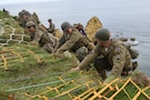 75th Ranger Regiment reenacts the climb at Pointe Du Hoc, France