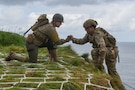 75th Ranger Regiment reenacts the climb at Pointe Du Hoc, France