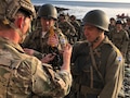 75th Ranger Regiment reenacts the climb at Pointe Du Hoc, France