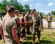 Brig. Gen. Richard Neely, the Adjutant General, Illinois National Guard, visits Soldiers from the 2nd Battalion, 123rd Field Artillery Regiment on June 7, 2019. Soldiers of the 2-123 FA were called to state active duty in support of Illinois Emergency Management Agency’s flood response in Western Illinois. Soldiers have to adapt daily depending on ever-changing weather conditions and rising water levels by placing barriers and conducting sandbag operations. There are approximately 110 miles of river and levee systems that run from Quincy to Alton, Illinois. Over 400 soldiers and a dozen agencies have come together and put down over 4.5 million sandbags.