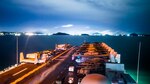 PHUKET, Thailand (June 8, 2019) Amphibious assault ship USS Boxer (LHD 4) anchors off the coast of Phuket, Thailand during a scheduled port visit. The Marines and Sailors of the 11th Marines Expeditionary Unit are deployed to the U.S. 7th Fleet area of operations to support regional stability, reassure partners and allies, and maintain a presence postured to respond to any crisis ranging from humanitarian assistance to contingency operations.