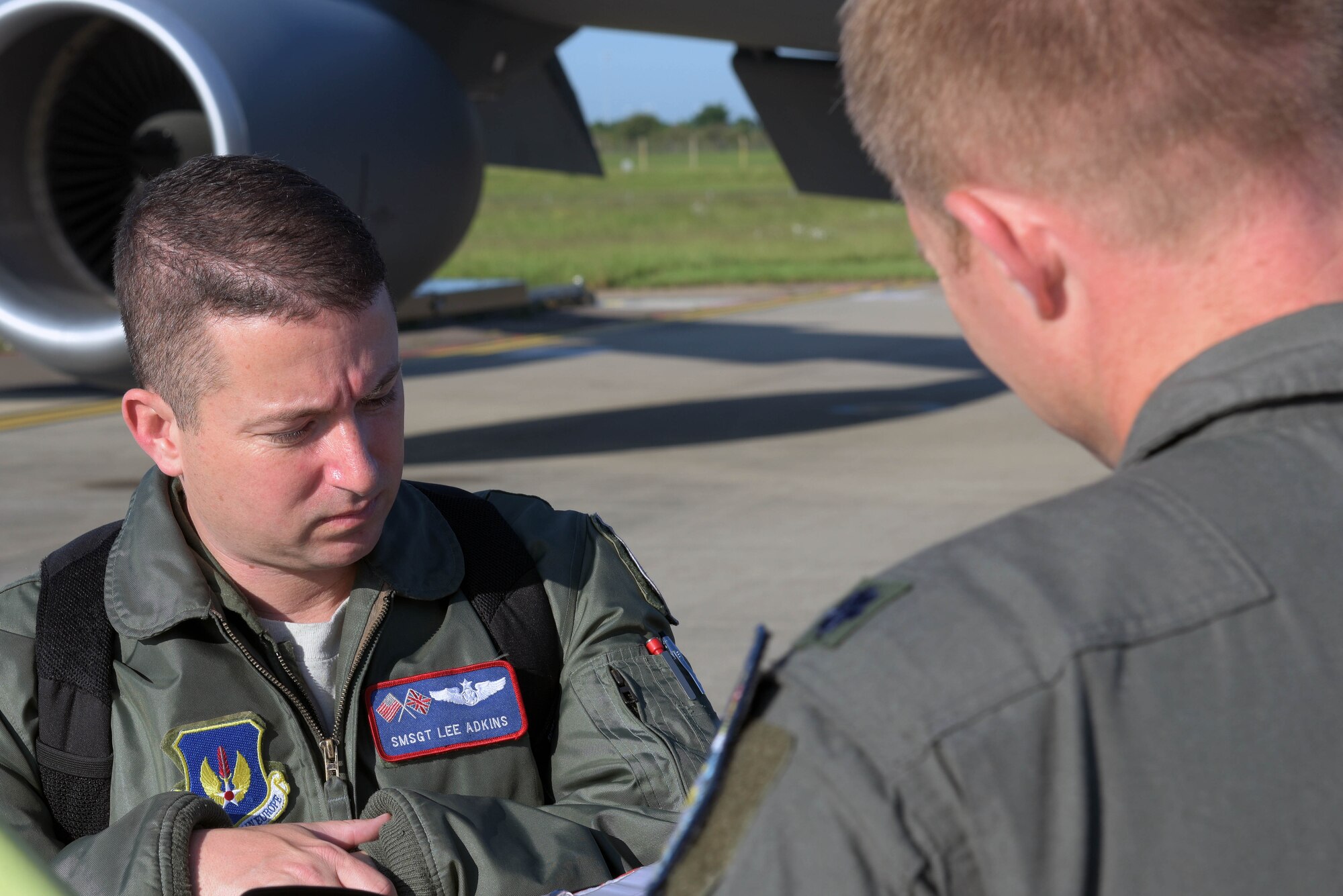 U.S. Air Force Senior Master Sgt. Lee Adkins, 100th Operations Group plans and exercises, looks over the pre-flight checklist prior to a refueling mission in support of the 75th anniversary commemoration of D-Day, at RAF Mildenhall, England, June 6, 2019. An epic multinational operation, D-Day forged partnerships and reinforced trans-Atlantic bonds that remain to this day. (U.S. Air Force photo by Senior Airman Benjamin Cooper)