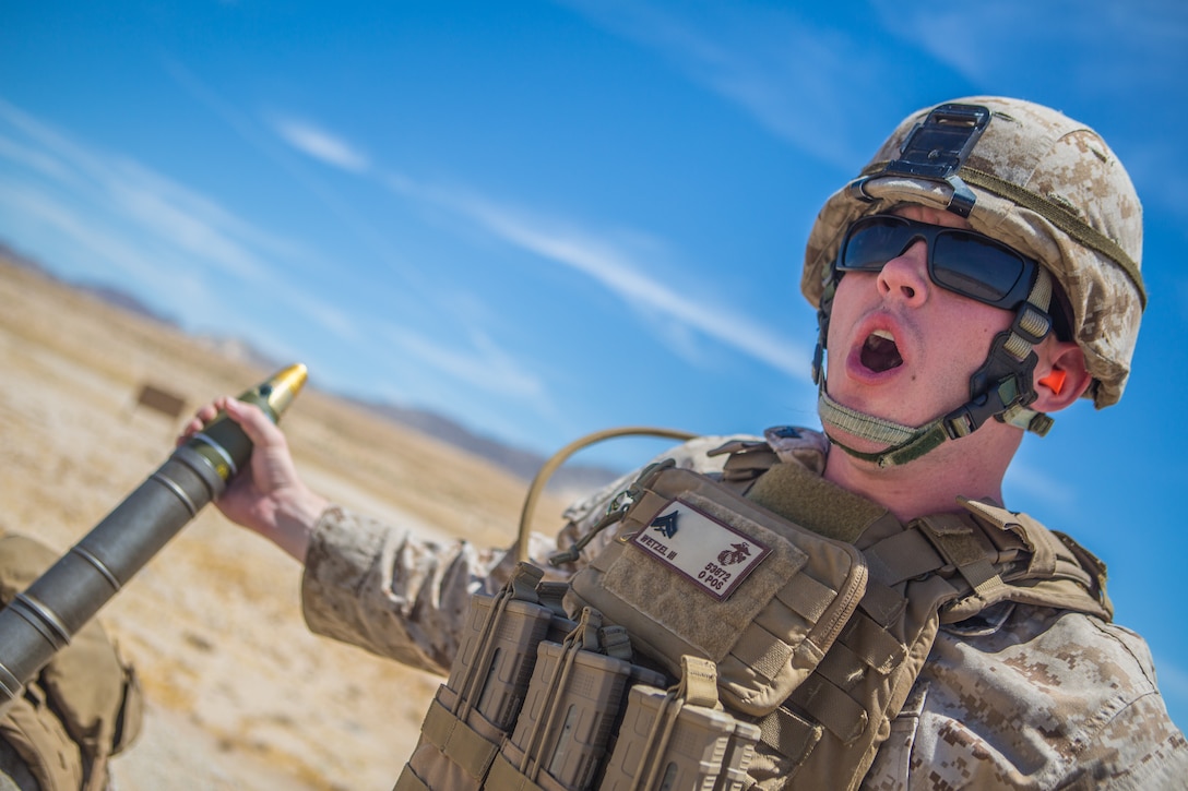 U.S. Marine Cpl. Andrew Wetzel III, a mortarman with Weapons Company, 3rd Battalion, 25th Marine Regiment, 4th Marine Division, loads a 60mm mortar system during an indirect fire exercise at Integrated Training Exercise 4-19 at Marine Corps Air Ground Combat Center, Twentynine Palms, Calif., June 6, 2019. ITX measures a unit’s ability to provide a cohesive, trained, and ready capability in support of service and Combatant Commander requirements.