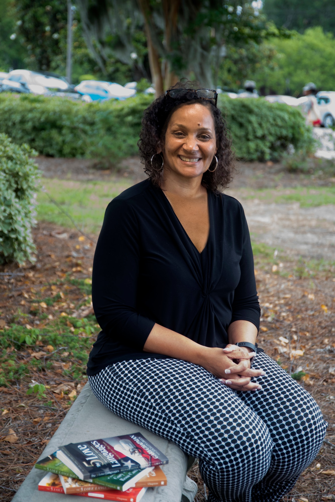Brenda Edmond, 315th Airlift Wing Director of Psychological Health at Joint Base Charleston, displays her favorite books to recommend, June 5, 2019, outside the JB Charleston Reserve Medical building. Edmond assumed the position of Director of Psychological Health in April 2019, after nearly 30 years of social work and mental health experience. (U.S. Air Force illustration/Staff Sgt. Della S. Creech)