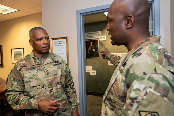 Command Sgt. Maj. John Sampa, 12th Command Sergeant Major of the Army National Guard, left, and Command Sgt. Maj. Courtney Ross, U.S. Army Financial Management Command command sergeant major have a discussion at the Maj. Gen. Emmett J. Bean Federal Center in Indianapolis June 6, 2019. During his visit, Sampa also met with Maj. Gen. David C. Coburn, USAFMCOM commanding general, and William Staley, USAFMCOM deputy to the commanding general, to discuss building stronger partnerships between Regular Army and National Guard financial management Soldiers. (U.S. Army photo by Mark R. W. Orders-Woempner)