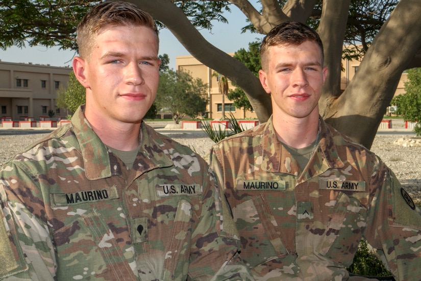 Army Spc. Joseph Maurino, left, and his identical twin brother, Pvt. Matthew Maurino, are currently deployed together to Camp As Sayliyah, Qatar. Both the Manalapan, New Jersey, natives are infantryman with the New Jersey Army National Guard’s 1st Battalion, 114th Infantry Regiment. Matthew is with Alpha Company and Joseph is with Bravo Company.