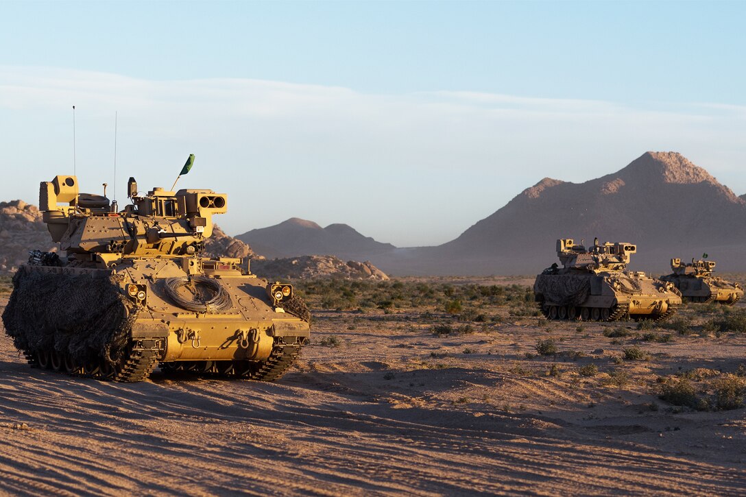 Vehicles travel together during an exercise.
