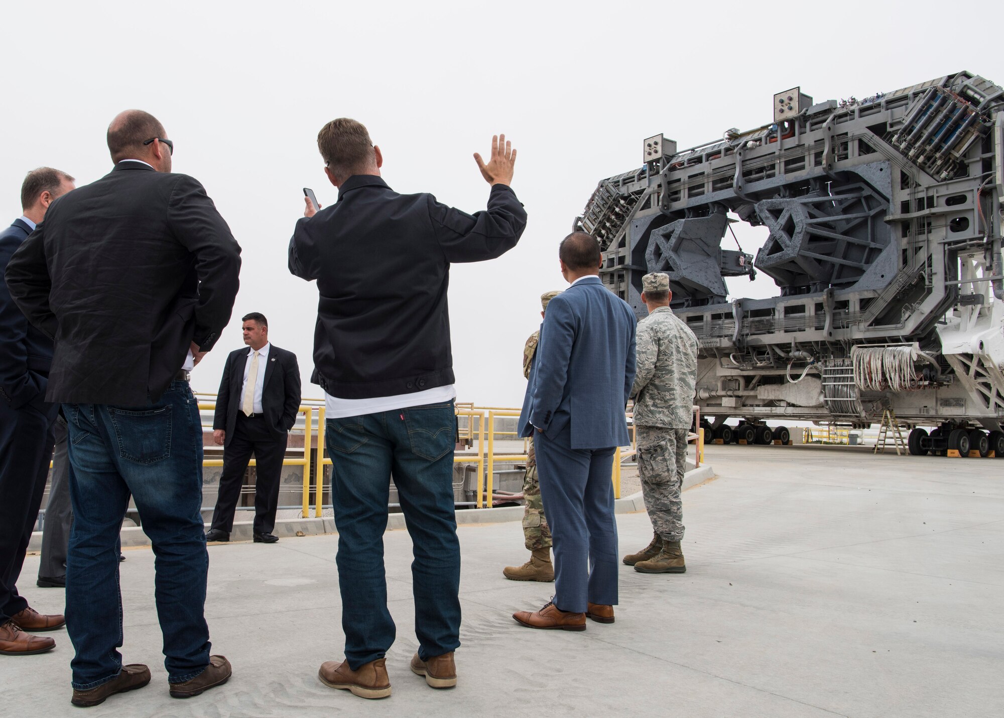 Eric Krystkowiak, Vandenberg SpaceX Launch Site Operations director, shows the NASA administrator a SpaceX transporter erector June 3, 2019, at Vandenberg Air Force Base, Calif. Jim Bridenstine, NASA administrator, was given a tour of the Space Launch Complex-4 to gain insight on Human Space Flight Support. Since the inception of the National Aeronautics and Space Act of 1958, the Department of Defense has provided Human Space Flight Support to NASA. (U.S. Air Force photo by Airman 1st Class Aubree Milks)