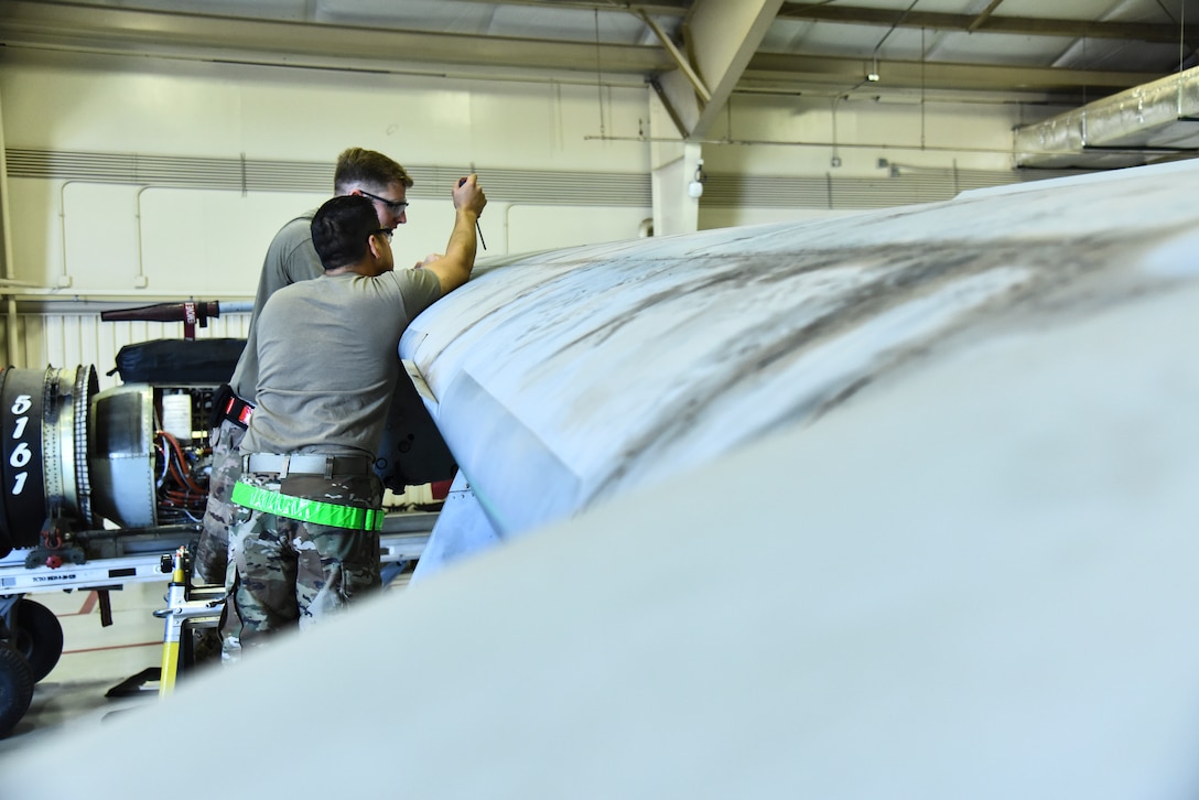 Students assigned to the 372d Training Squadron, Detachment 11, perform hands-on training on an A-10C Thunderbolt II at Davis-Monthan Air Force Base, Ariz., June 4, 2019. The 372d TRS, Det. 11, not only trains many Airmen on improving their skills, but is also the next stop for Mission Ready Airmen – brand new Air Force personnel who have graduated from maintenance technical school. (U.S. Air Force photo by Senior Airman Mya M. Crosby)