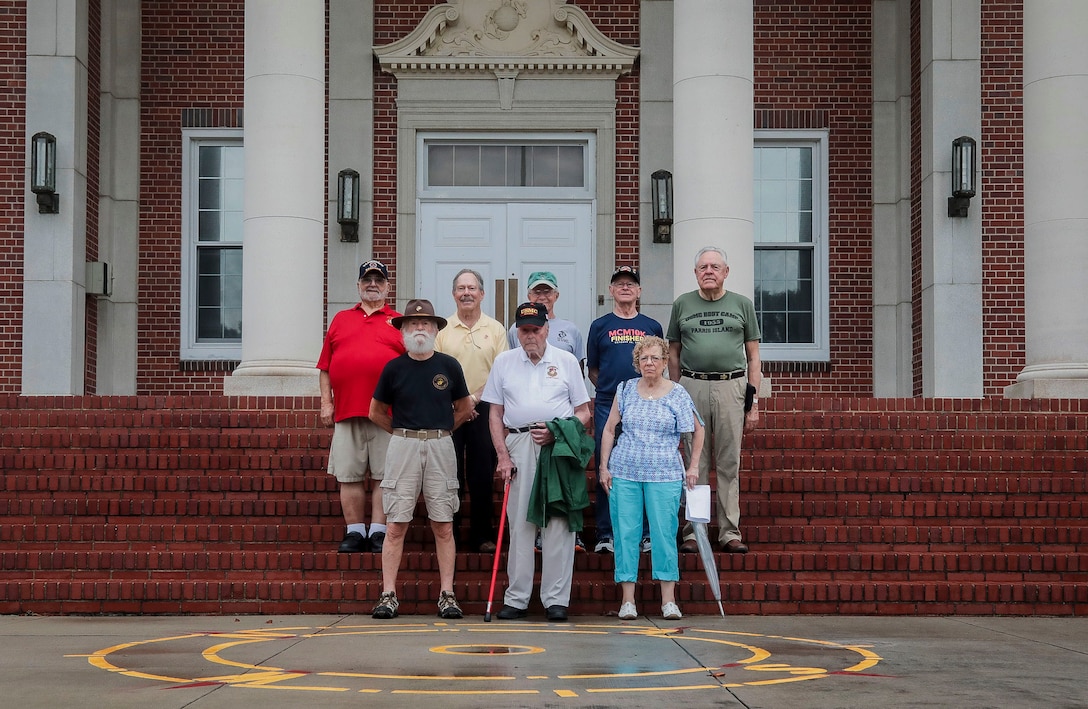 Marine Corps veterans and members of the Marine Corps league gather for a group photo at the steps of the general's building on Marine Corps Recruit Depot Parris Island, S.C. June 7, 2019. The Marines gathered to commemorate 64 years of graduating recruit training.
