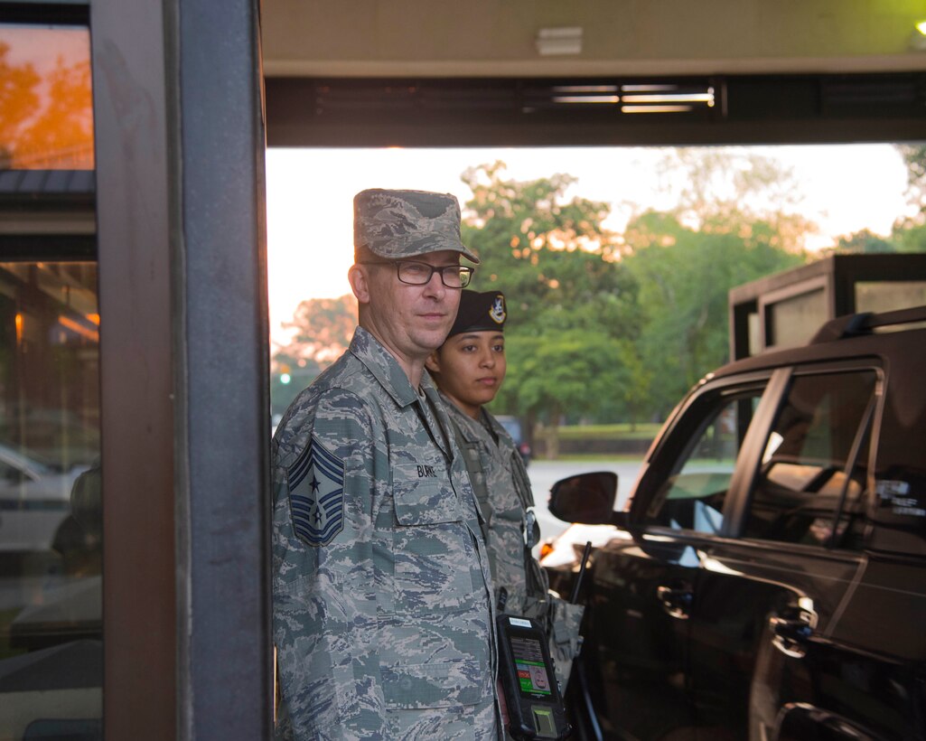 U.S. Air Force Chief Master Sgt. John-Paul B. Burke, Command Chief Master Sergeant of the 315th Airlift Wing, Joint Base Charleston, SC, works the front gate at Joint Base Charleston June 2, 2019. Burke wanted to get to know 315 Airlift Wing Airmen around base.