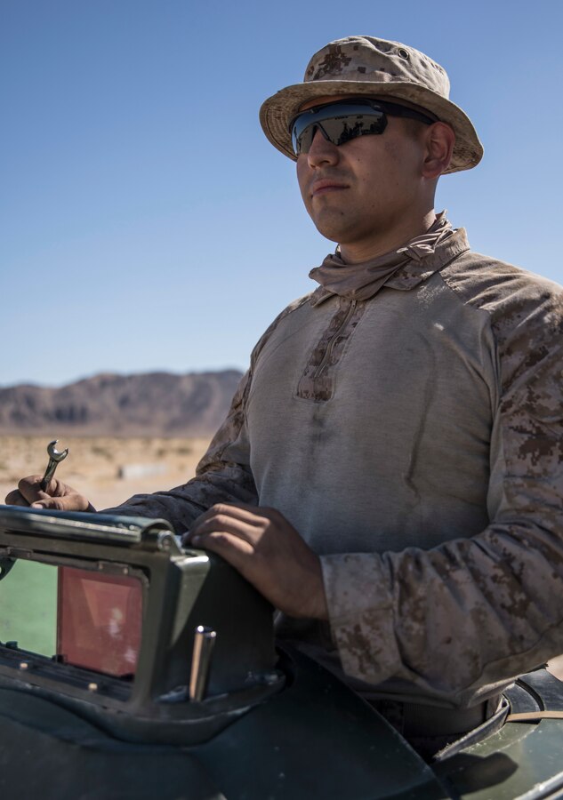 U.S. Marine Lance Cpl. Adolfo-James Lerma, a driver with 4th Assault Amphibian Battalion, 4th Marine Division boresights an Assault Amphibious Vehicle on Range 110 during Integrated Training Exercise 4-19 at Marine Corps Air Ground Combat Center Twentynine Palms, Calif., June 7, 2019. Marines from over 40 units participate in ITX, making it the largest U.S. Marine Corps Reserve training exercise in 2019. (U.S. Marine Corps photo by Cpl. Tessa D. Watts)