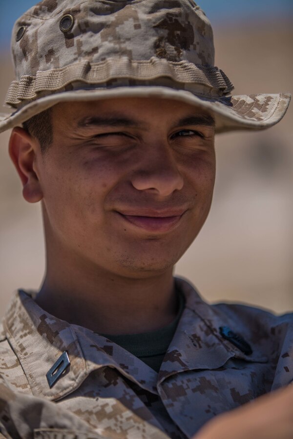 U.S. Navy Hospitalman Apprentice Alejandro Haespana, a medical corpsman with 4th Amphibious Assault Battalion, 4th Marine Division, poses for a photo at Observation Post Left during Integrated Training Exercise 4-19 at Marine Corps Air Ground Combat Center, Twentynine Palms, Calif., June 8, 2019. Today’s Marine Reserve is a critical component of the Marine Corps’ Total Force, and training like ITX helps ensure Reserve units combat effectiveness and proficiency for world-wide deployment. (U.S. Marine Corps photo by Lance Cpl. Preston L. Morris)