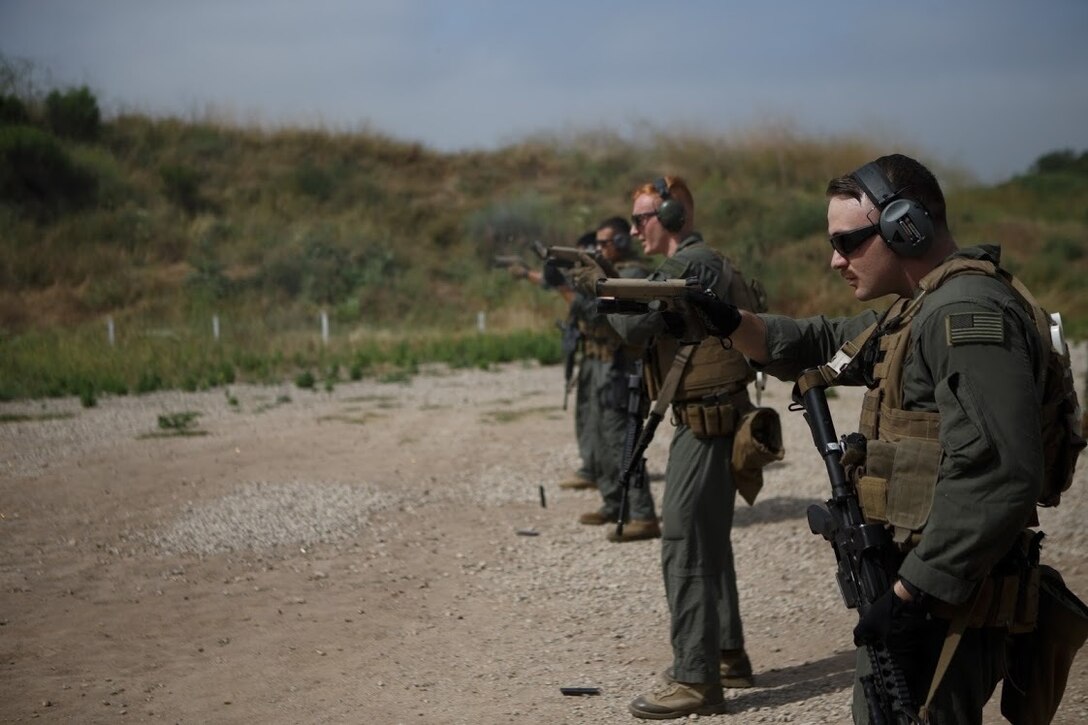 Marines with the Marine Corps Air Station Miramar Special Reactions Team (SRT),

fire the M1911 Service Pistol during training at MCAS Miramar, Calif., June 5. This training is regularly conducted to sharpen the Marines’ skills and further the Marine Corps’ mission of operational readiness. (U.S. Marine Corps photo by Lance Cpl. Cheng Chang)