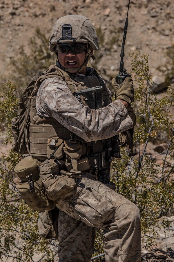 A U.S. Marine with Kilo Company, 3rd Battalion, 25th Marine Regiment, 4th Marine Division participates in a platoon attack on Range 410, an overhead fire infantry company training range, during Integrated Training Exercise 4-19 at Marine Corps Air Ground Combat Center Twentynine Palms, Calif., June 8, 2019. Range 410 is one of the most vigorous ranges used for training rifle companies and is used every year by multiple units during ITX. (U.S. Marine Corps photo by Cpl. Tessa D. Watts)