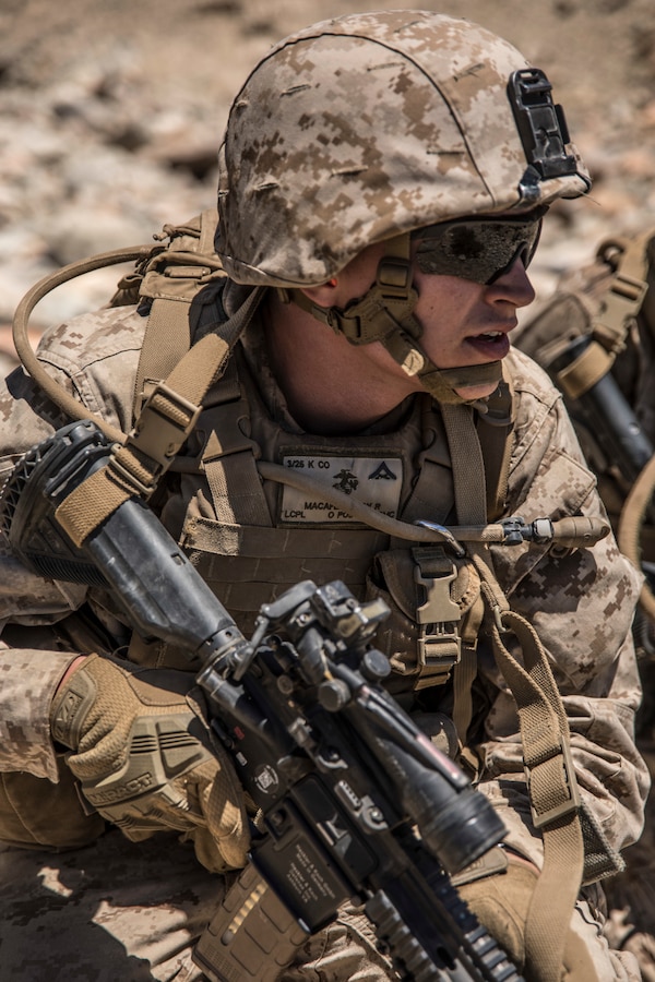 A U.S. Marine with Kilo Company, 3rd Battalion, 25th Marine Regiment, 4th Marine Division participates in a platoon attack on Range 410, an overhead fire infantry company training range, during Integrated Training Exercise 4-19 at Marine Corps Air Ground Combat Center Twentynine Palms, Calif., June 8, 2019. Range 410 is one of the most vigorous ranges used for training rifle companies and is used every year by multiple units during ITX. (U.S. Marine Corps photo by Cpl. Tessa D. Watts)