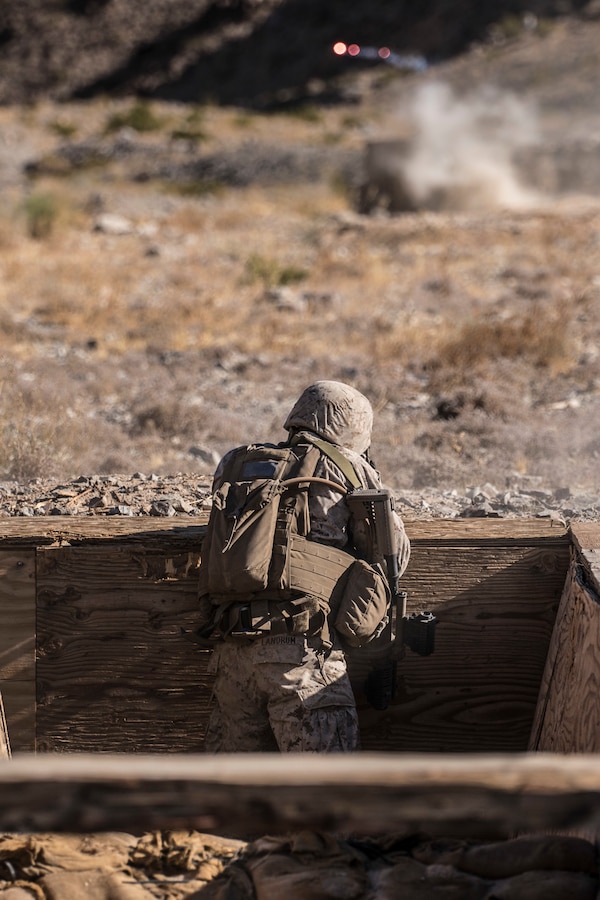 A U.S. Marine with India Company, 3rd Battalion, 25th Marine Regiment, 4th Marine Division engages the enemy in a platoon attack on Range 410, an overhead fire infantry company training range, during Integrated Training Exercise 4-19 at Marine Corps Air Ground Combat Center Twentynine Palms, Calif., June 9, 2019. ITX 4-19 is an essential component of the Marine Forces Reserve training cycle. It serves as the principal exercise for assessing a unit’s readiness. (U.S. Marine Corps photo by Cpl. Tessa D. Watts)
