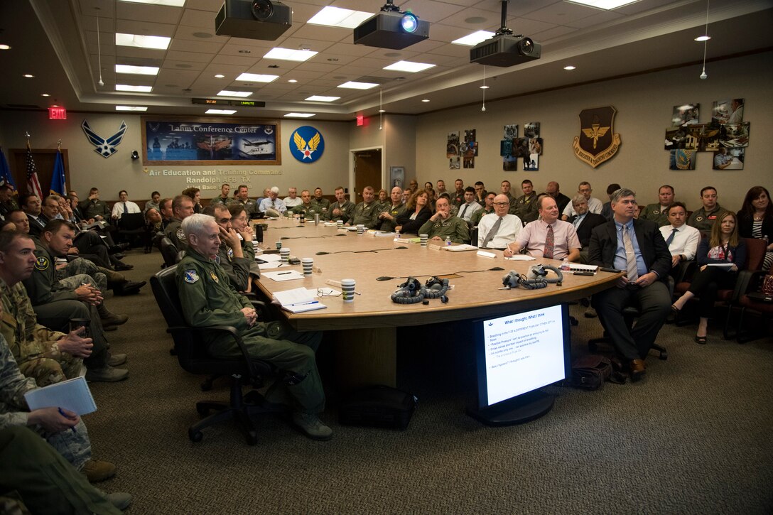 Attendees from both in and outside the Department of Defense listen to a briefing on the T-6 On-Board Oxygen Generating Systems during a conference at Joint Base San Antonio-Randolph, Texas, May 29-30, 2019. During the conference, machine and human aspects of the problem were discussed, as well as the human-machine interface as part of the on-going effort to improve the safety of the OBOGS. (U.S. Air Force photo/Senior Airman Story Archer)