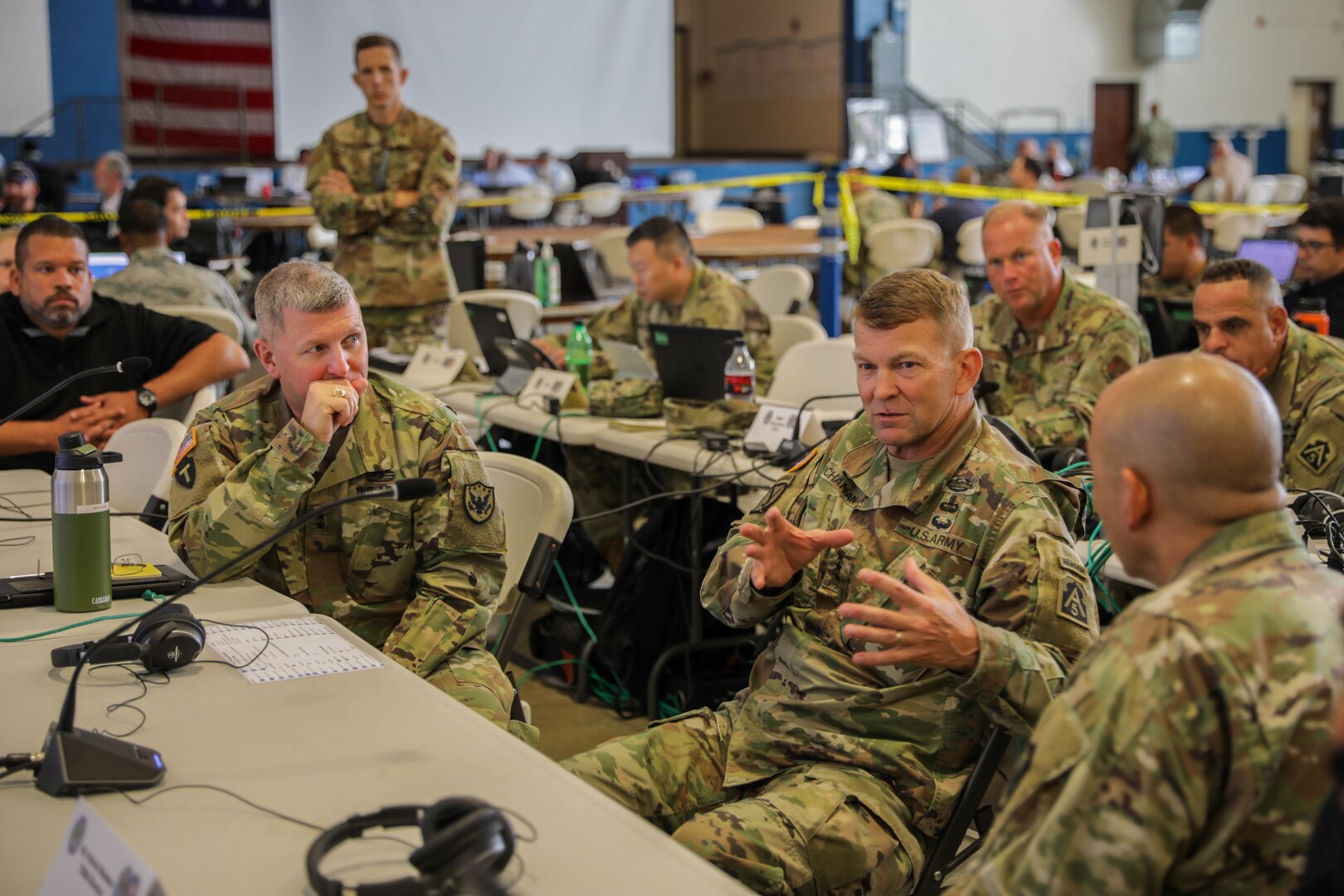 Commander, US Army North (ARNORTH) Lt. Gen. Jeffrey Buchanan speaks with Commander, Joint Task Force Civil Support (JTF-CS) Maj. Gen. William “Bill" Hall (left), and JTF-CS Director of Operations Col. Eric Oh during a ten minute drill as part of Ardent Sentry 2019. The ARNORTH-led exercise was conducted in support of FEMA’s exercise Shaken Fury, which simulated a catastrophic earthquake along the New Madrid Seismic Zone (NMSZ) near Memphis, Tennessee that affected eight states. Exercise Shaken Fury tested the national incident management system. During the exercise, which ran from May 29 - June 5, nearly 100 JTF-CS personnel supported more than 50 command members who were forward-deployed to Nashville, Tenn.; Berry Field, Tenn.; Jackson, Miss.; Jefferson City, Mo. and Ft. Sam Houston, Tx. in response to a notional 7.7 magnitude earthquake in the New Madrid Seismic Zone (NMSZ). Ardent Sentry is a U.S. Northern Command exercise geared toward building and strengthening interagency relationships by providing defense support of civil authorities during the NMSZ earthquake scenario. (Official DoD photo by Mass Communication Specialist 3rd Class Michael Redd/released)