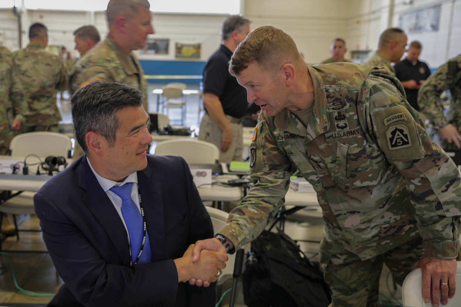 Commander, US Army North (ARNORTH) Lt. Gen. Jeffrey Buchanan greets Director of the Tennessee Emergency Management Agency Patrick Sheehan inside the joint operation center during exercise Ardent Sentry 2019. The ARNORTH-led exercise was conducted in support of FEMA’s exercise Shaken Fury, which simulated a catastrophic earthquake along the New Madrid Seismic Zone (NMSZ) near Memphis, Tennessee that affected eight states. Exercise Shaken Fury tested the national incident management system. During the exercise, which ran from May 29 - June 5, nearly 100 JTF-CS personnel supported more than 50 command members who were forward-deployed to Nashville, Tenn.; Berry Field, Tenn.; Jackson, Miss.; Jefferson City, Mo. and Ft. Sam Houston, Tx. in response to a notional 7.7 magnitude earthquake in the New Madrid Seismic Zone (NMSZ). Ardent Sentry is a U.S. Northern Command exercise geared toward building and strengthening interagency relationships by providing defense support of civil authorities during the NMSZ earthquake scenario. (Official DoD photo by Mass Communication Specialist 3rd Class Michael Redd/released)