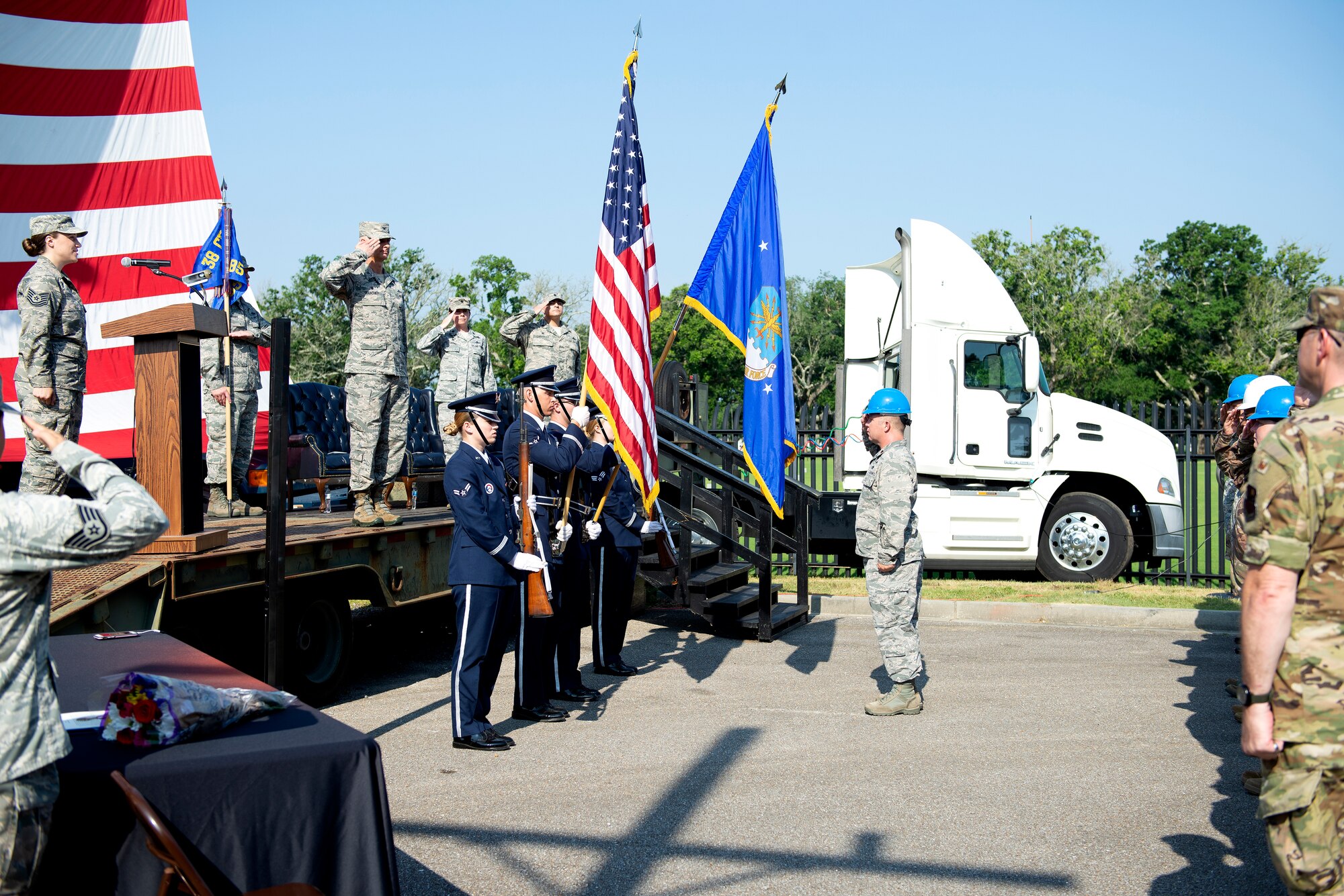 Airmen salute the U.S. flag during the National Anthem at the 85th Engineering Installation Squadron change of command ceremony outside Maltby Hall on Keesler Air Force Base, Mississippi, June 4, 2019. The ceremony is a symbol of command being exchanged from one commander to the next. (U.S. Air Force photo by Airman 1st Class Kimberly L. Mueller)