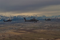 Aircrews from the 1/211th Attack-Reconnaissance Battalion conduct formation practice to prepare for the Funeral Flyover for Army Air Forces 2nd Lt. Lynn W. Hadfield whose remains were recovered after 74 years of being Missing In Action.