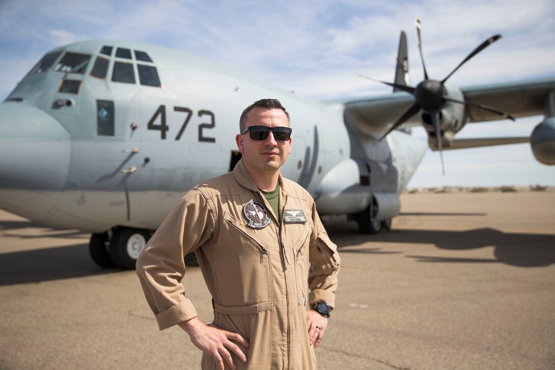 U.S. Marine Corps Capt. Robert Attebury, a KC-130 Hercules Pilot assigned to Marine Aerial Refueler Squadron (VMGR) 252, poses for a photograph after his flight on the flightline of Million Air in Yuma, Ariz., April 3, 2019. (U.S. Marine Corps photo by Cpl. Sabrina Candiaflores)