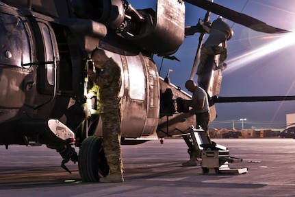Soldiers with 2nd Battalion 211th Aviation Regiment conducting aircraft maintenance while on deployment in Afghanistan.