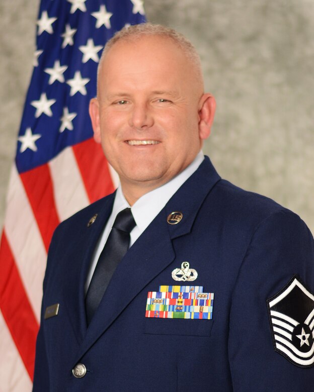 Master Sgt. Eric Whitesel, 507th Aircraft Maintenance Squadron KC-135 Stratotanker dedicated crew chief, stands for an official photo January 18, 2018, at Tinker Air Force Base, Oklahoma. (U.S. Air Force photo by Tech. Sgt. Lauren Gleason)