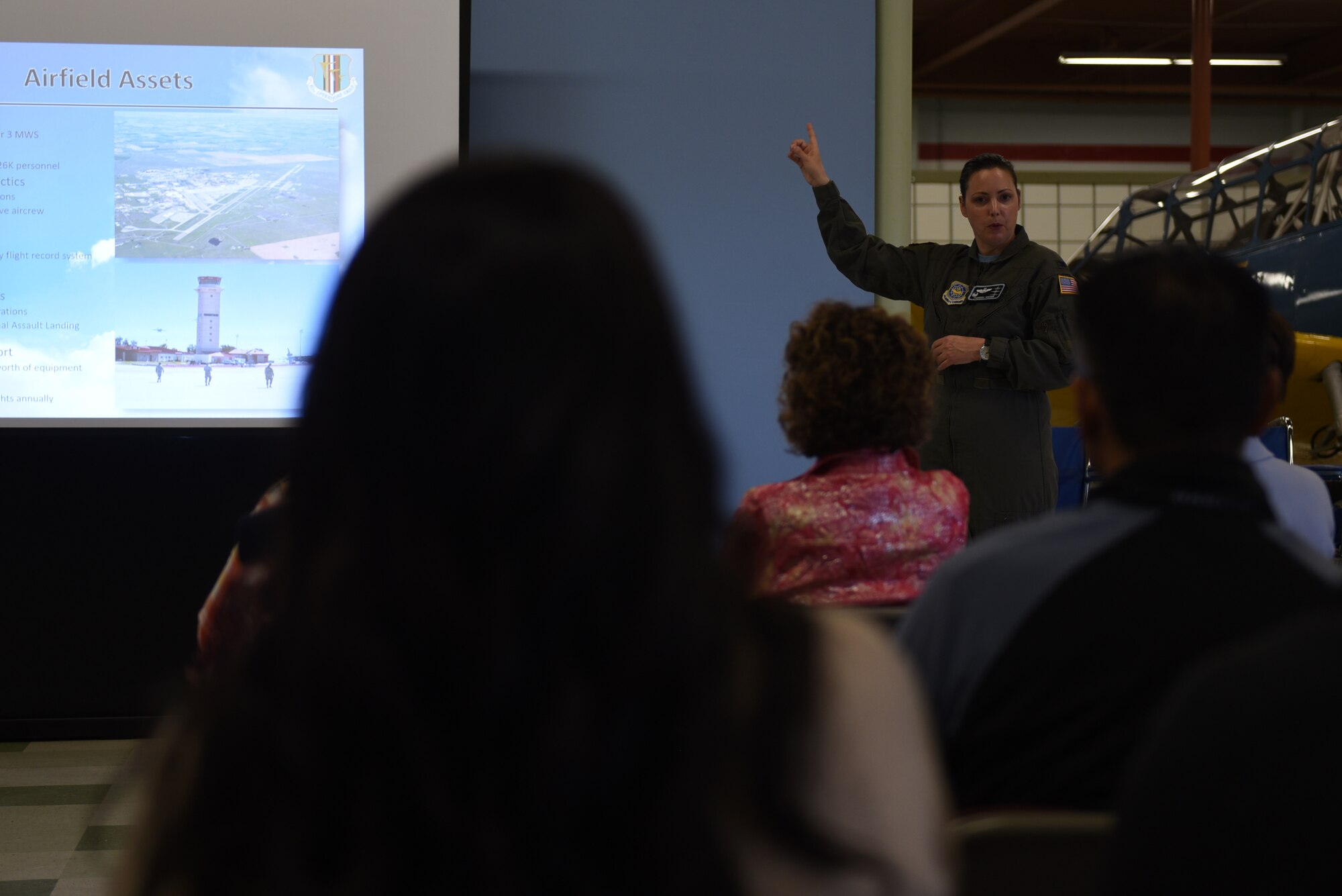 U.S. Air Force Col. Theresa Weems, 60th Operations Group commander, briefs Honorary Commanders on the base’s mission June 7, 2019, at Travis Air Force Base, California. The purpose of the Travis’ Honorary Commander Program is to promote relationships between base senior leadership and civilian partners, foster civic appreciation of the Air Force mission and its Airmen, maximize opportunities to share the Air Force story with new stewards and to communicate mutual interest, challenges and concerns that senior leaders and civilian stakeholders have in common. (U.S. Air Force photo by Airman 1st Class Cameron Otte)