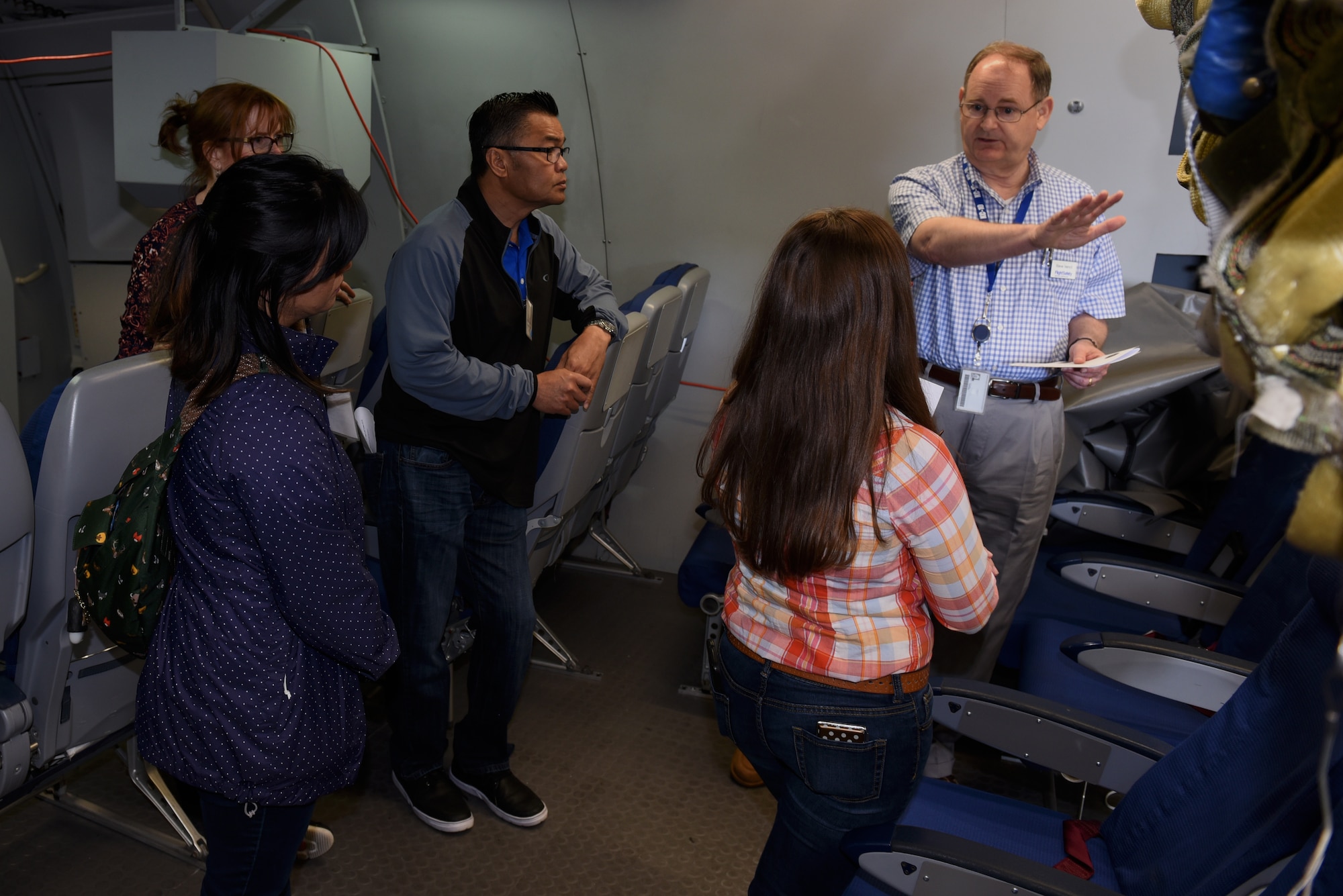 Steve Vancil, Flight Safety Services Corporation site manager, right, briefs Honorary Commanders about aspects of a KC-10 Extender while in a simulator June 7, 2019, at Travis Air Force Base, California. The purpose of the Travis’ Honorary Commander Program is to promote relationships between base senior leadership and civilian partners, foster civic appreciation of the Air Force mission and its Airmen, maximize opportunities to share the Air Force story with new stewards and to communicate mutual interest, challenges and concerns that senior leaders and civilian stakeholders have in common. (U.S. Air Force photo by Airman 1st Class Cameron Otte)