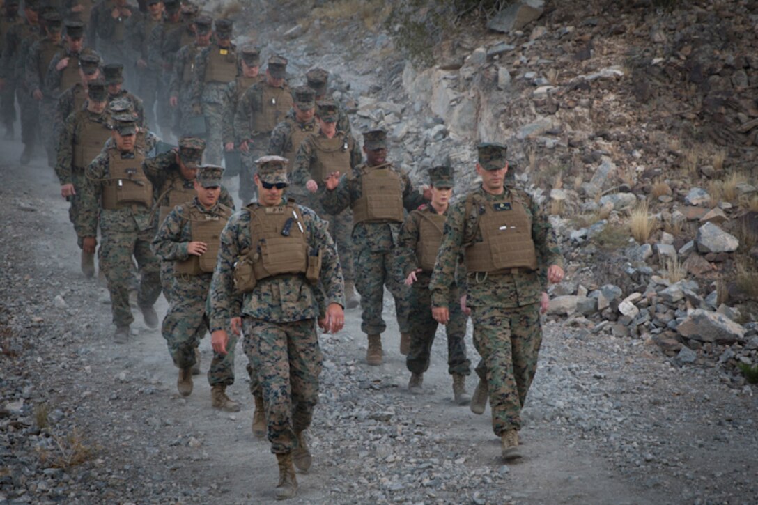 U.S. Marines with Marine Aviation Logistics Squadron (MALS) 13 hike up telegraph as part of a unit training event in Yuma Ariz., 18, 2019. The purpose of this hike was to promote unit moral within MALS-13. (U.S. Marine Corps photo by Lance Cpl. Joel Soriano)