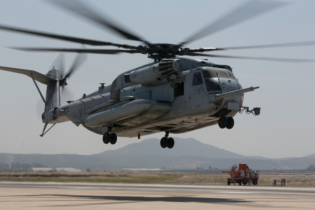 A U.S. Marine Corps CH-53E Super Stallion with Marine Aircraft Group (MAG) 16, 3rd Marine Aircraft Wing (MAW), takes off from the flight line during a mass flight exercise at Marine Corps Air Station Miramar, Calif., June 6, 2019. As America’s “Force in Readiness,” Marines must remain ready when others are not. The exercise highlights the 3rd MAW’s professional warriors, Marines who can think critically and act decisively. (U.S. Marine Corps photo by Lance Cpl. Julian Elliott-Drouin)