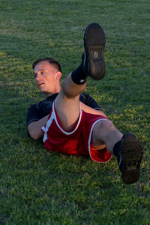 A U.S. Marine Stationed at Marine Corps Air Station (MCAS) Yuma participates in High Intensity Tactical Training (HITT) on The Lawn on the parade deck at MCAS Yuma Ariz., April 26, 2019. HITT on the Lawn is a physical training event that is open to anyone with base access and provides them with a physical training opportunity. (U.S. Marine Corps photo by Lance Cpl. Joel Soriano)