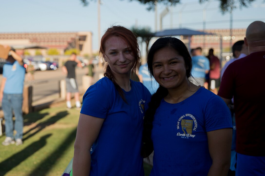 U.S. Marines Stationed at Marine Corps Air Station (MCAS) Yuma pose for a photo while they participate in the 2019 Environmental Earth Day Fun Run at MCAS Yuma Ariz., April 26, 2019. The Environmental Earth Day Fun Run is a 5k race held annually bringing awareness to Marines, Sailors, and civilians about the protection of our environment (U.S. Marine Corps photo by Lance Cpl. Joel Soriano)