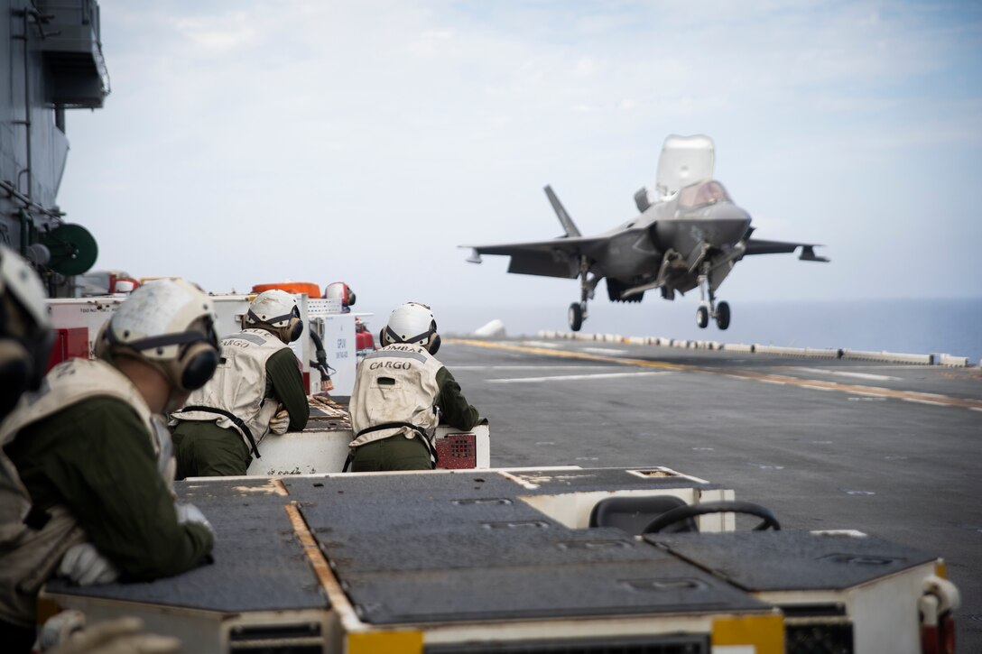 An F-35B Lightning II fighter aircraft with Marine Medium Tiltrotor Squadron 265 (Reinforced) lands aboard the amphibious assault ship USS Wasp (LHD 1) during flight operations while underway in the Philippine Sea, June 4, 2019. The 31st Marine Expeditionary Unit, the Marine Corps’ only continuously forward-deployed MEU, provides a flexible and lethal force ready to perform a wide range of military operations as the premier crisis response force in the Indo-Pacific region. (Official U.S. Marine Corps photo by Lance Cpl. Brennan Priest)
