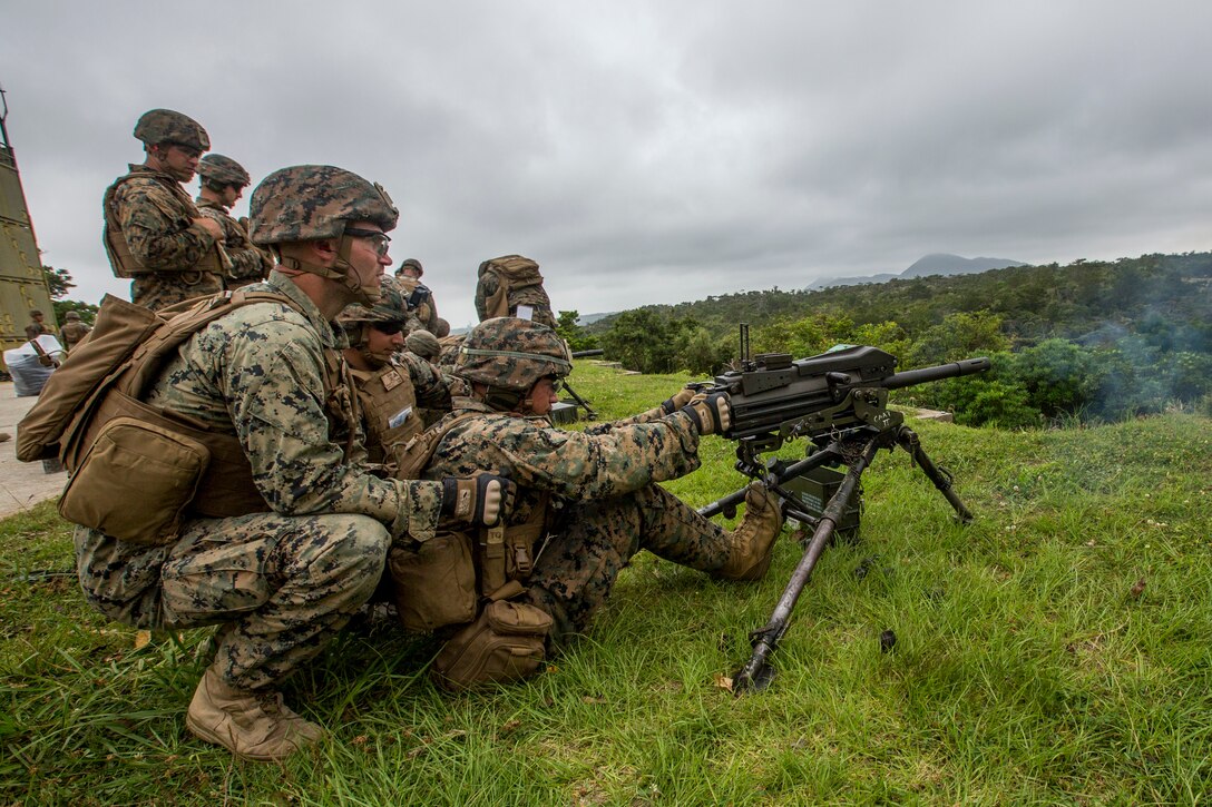 Marines with Weapons Company, Battalion Landing Team, 2nd Battalion, 1st Marines, fire a Mark 19 automatic grenade launcher during training at Camp Schwab, Okinawa, Japan, May 28, 2019. Weapons Company maintains a variety of heavy and medium machine guns, grenade launchers and rockets. BLT 2/1 is the Ground Combat Element for the 31st Marine Expeditionary Unit. The 31st MEU, the Marine Corps’ only continuously forward-deployed MEU, provides a flexible and lethal force ready to perform a wide range of military operations as the premier crisis response force in the Indo-Pacific region. (U.S. Marine Corps photo by Lance Cpl. Cameron E. Parks/Released)