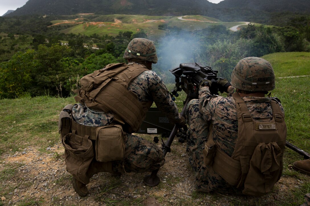 Marines with Weapons Company, Battalion Landing Team, 2nd Battalion, 1st Marines, fire a Mark 19 automatic grenade launcher during training at Camp Schwab, Okinawa, Japan, May 28, 2019. Weapons Company maintains a variety of heavy and medium machine guns, grenade launchers and rockets. BLT 2/1 is the Ground Combat Element for the 31st Marine Expeditionary Unit. The 31st MEU, the Marine Corps’ only continuously forward-deployed MEU, provides a flexible and lethal force ready to perform a wide range of military operations as the premier crisis response force in the Indo-Pacific region. (U.S. Marine Corps photo by Lance Cpl. Cameron E. Parks/Released)
